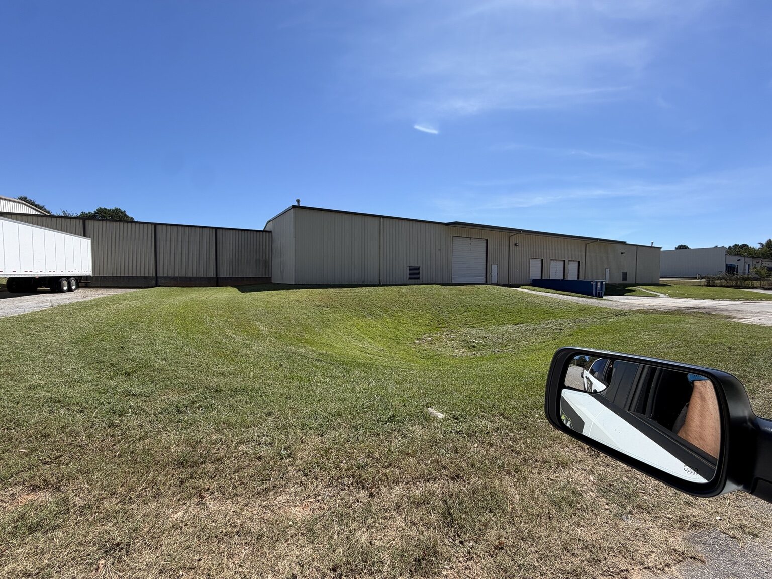 Large commercial property lawn after mowing service